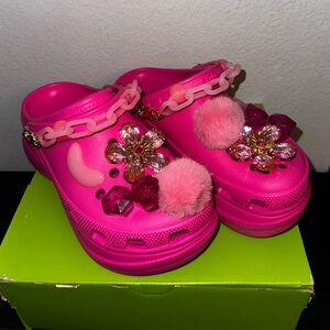 CROCS Hot Pink Clogs with Floral and Pom-Pom Accents